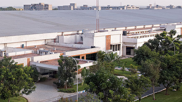 The outside of an ethical factory building in India.