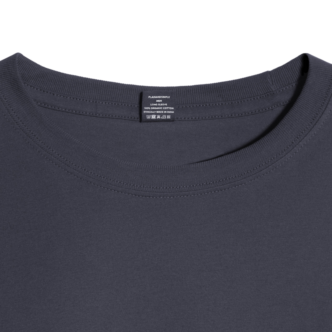 A close up of a neck label in a men's dark grey long sleeve crew neck organic cotton t shirt.