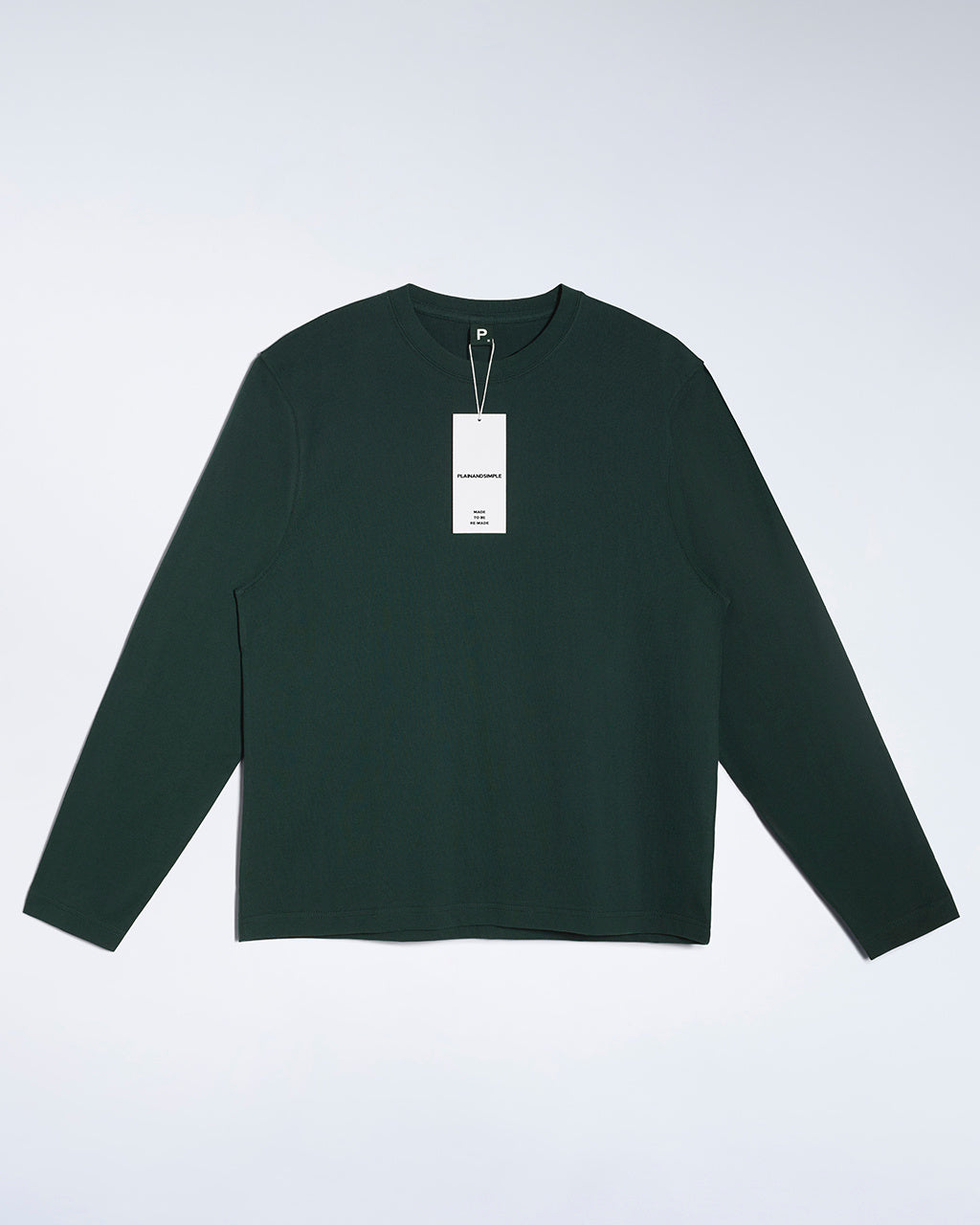 A flatlay of a men's plain green long sleeve crew neck organic cotton t shirt.