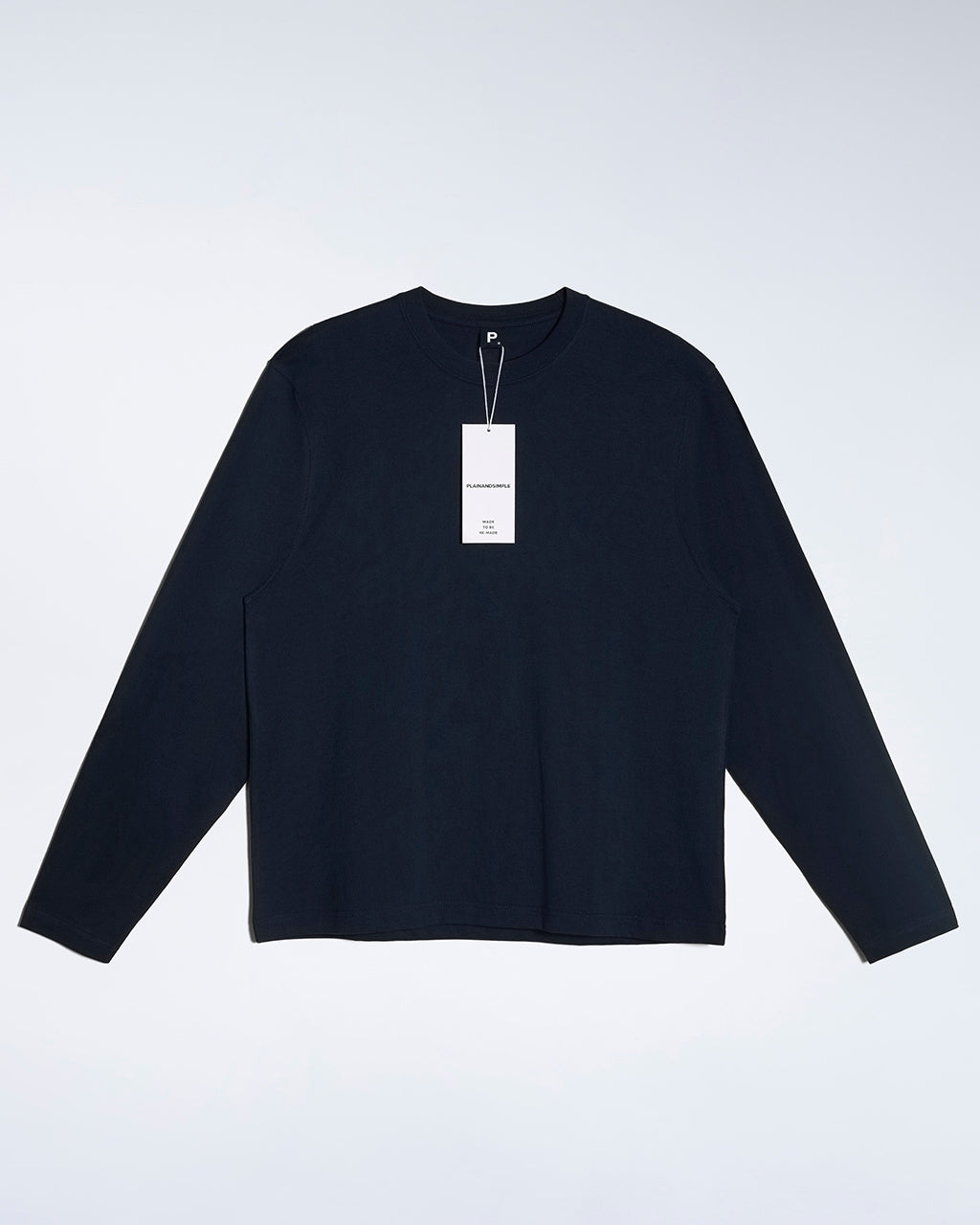 A flatlay of a men's plain navy long sleeve crew neck organic cotton t shirt.