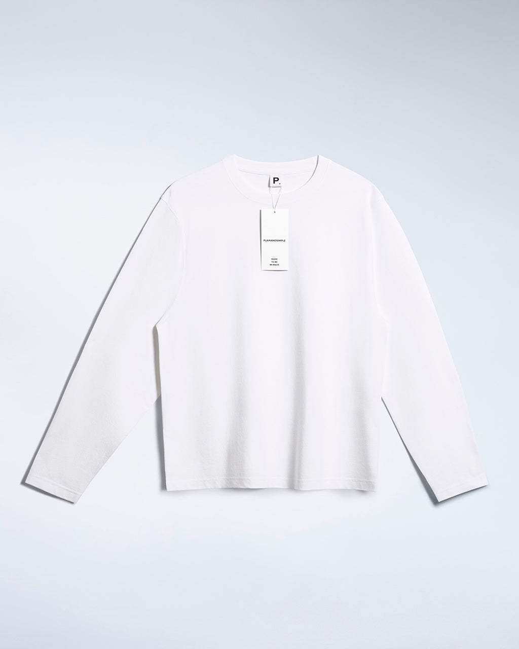 A flatlay of a men's plain white long sleeve crew neck organic cotton t shirt.