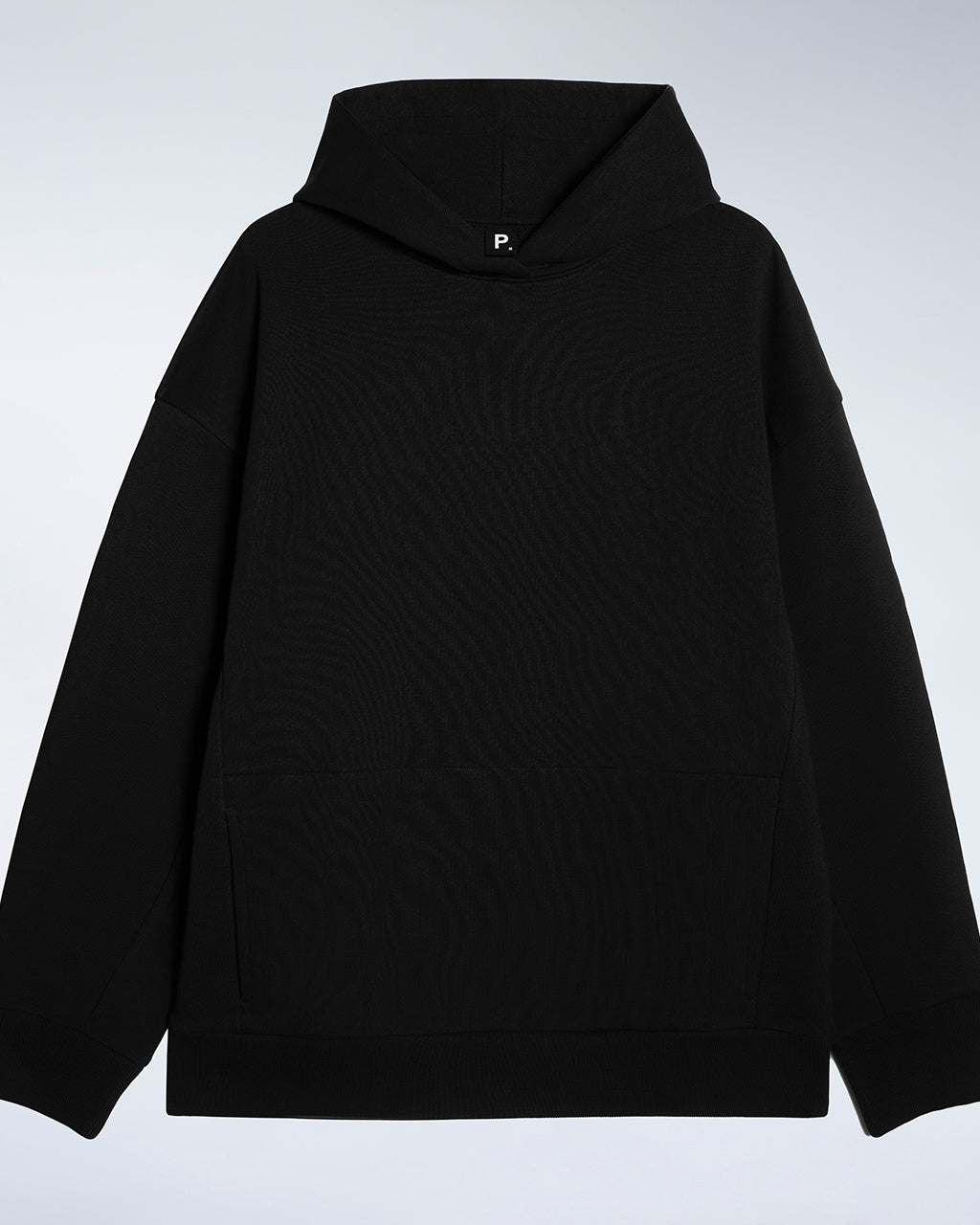 A flatlay of a men's, oversized, black organic cotton hoodie.
