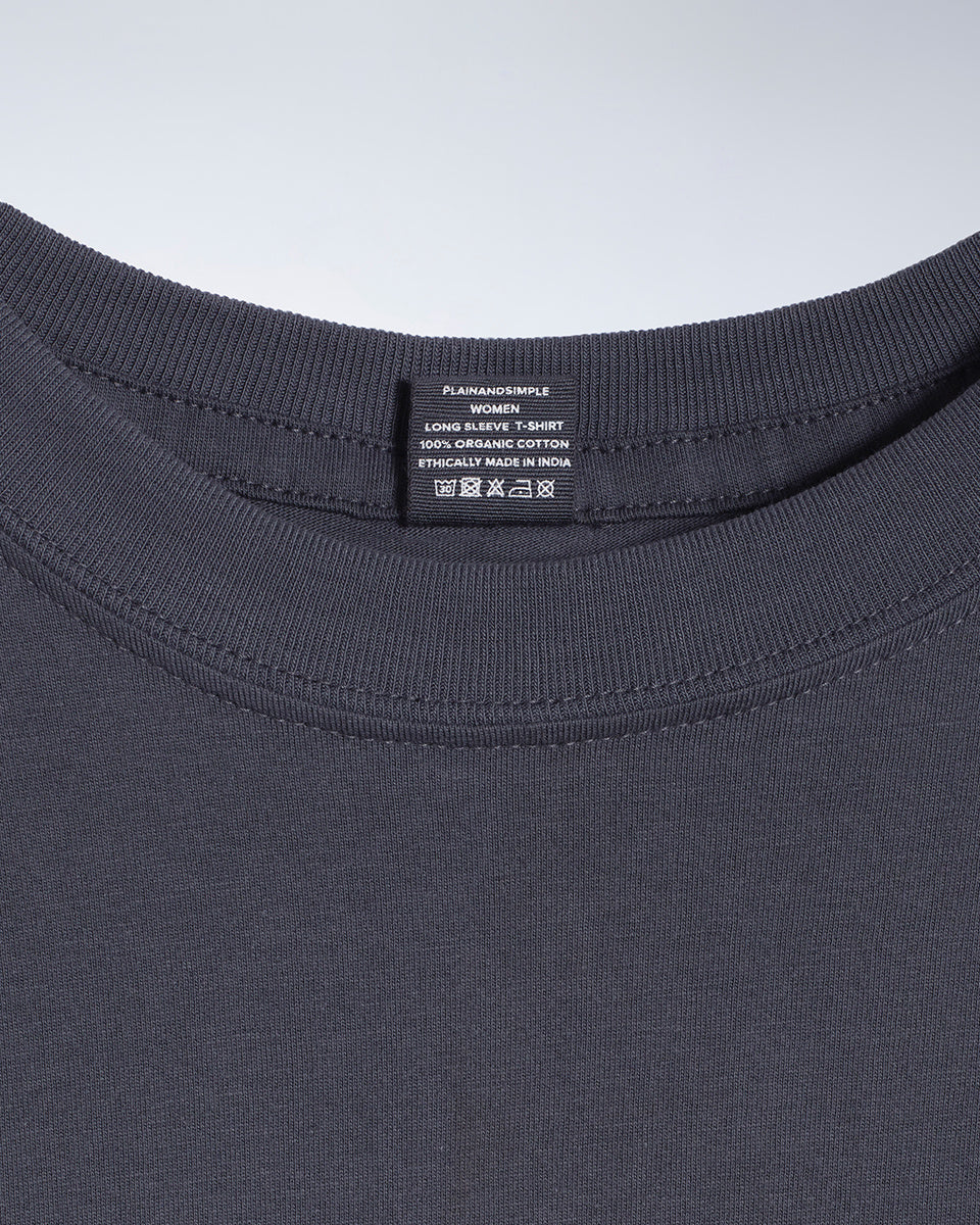 A close up of a neck label in a women's dark grey long sleeve crew neck organic cotton t shirt.