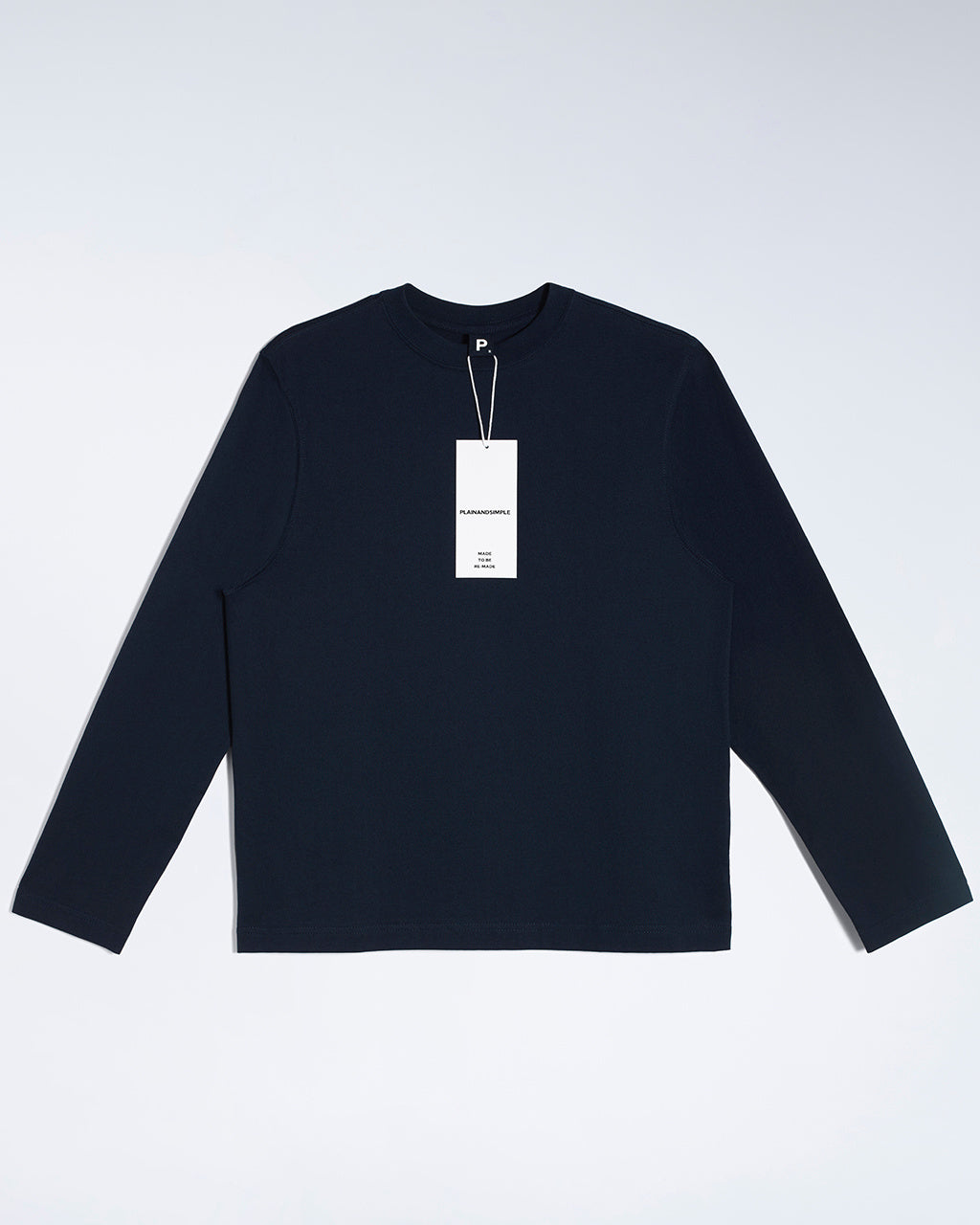 A flatlay of a women's plain navy long sleeve crew neck organic cotton t shirt.