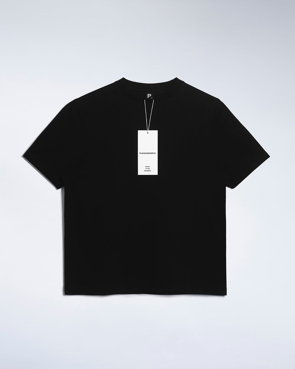 A flatlay of a women's plain black short sleeve crew neck organic cotton t shirt.