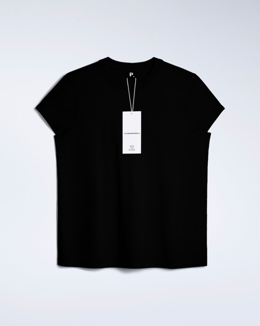 A flatlay of a women's plain black short sleeve crew neck organic cotton t shirt.