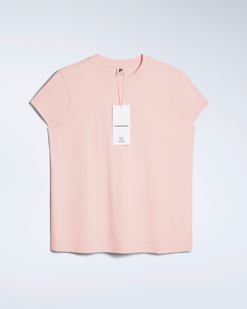 A flatlay of a women's plain pink short sleeve crew neck organic cotton t shirt.