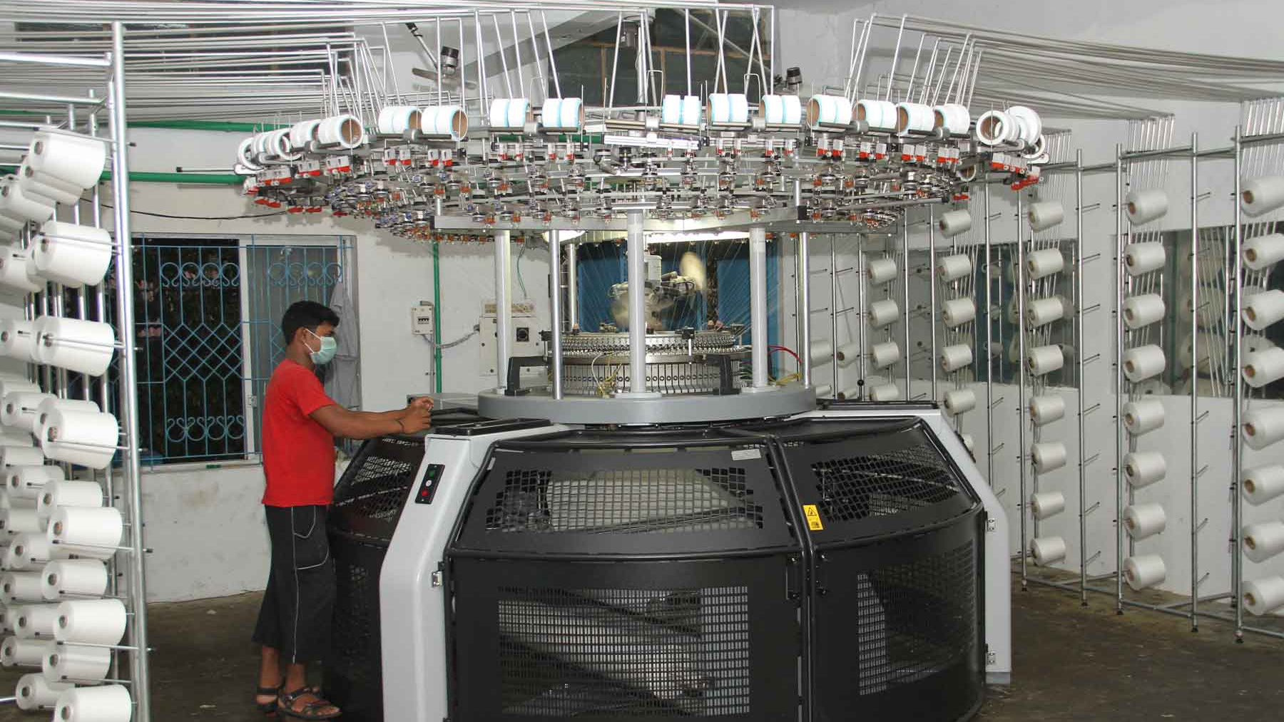 A photo of a large machine in an ethical factory in India.