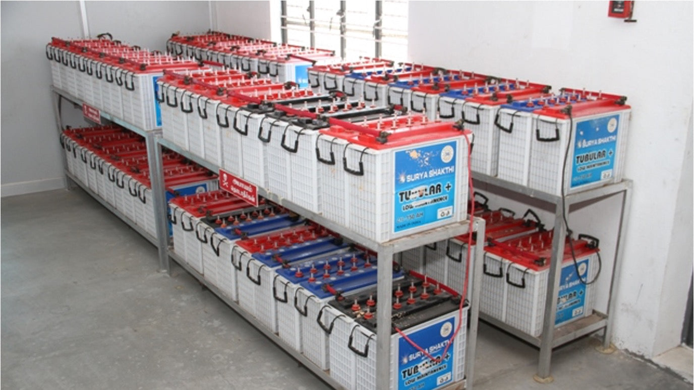 A photo of solar energy storage at an ethical factory in India.
