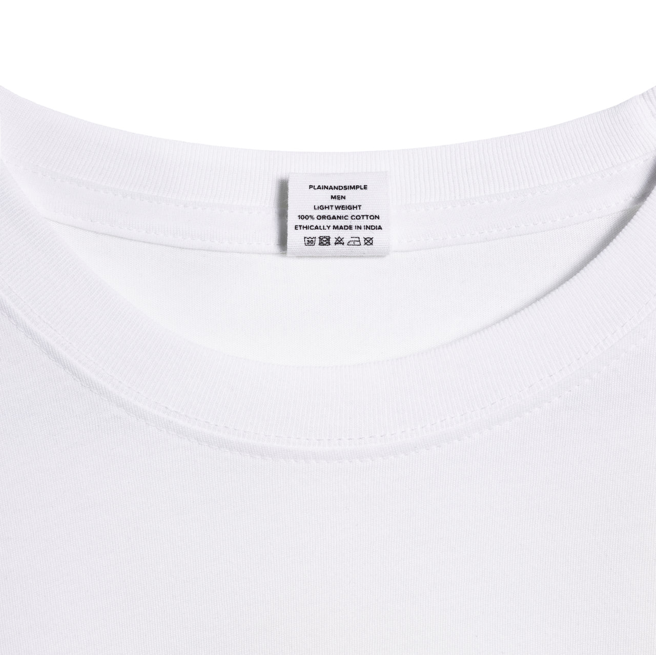 A close up of an neck label in a men's white short sleeve lightweight organic cotton t shirt.