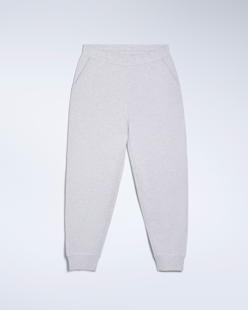 A flatlay of a pair of grey, organic cotton joggers.