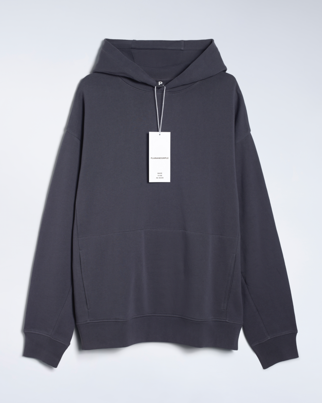 A flatlay of a dark grey, oversized, organic cotton hoodie.