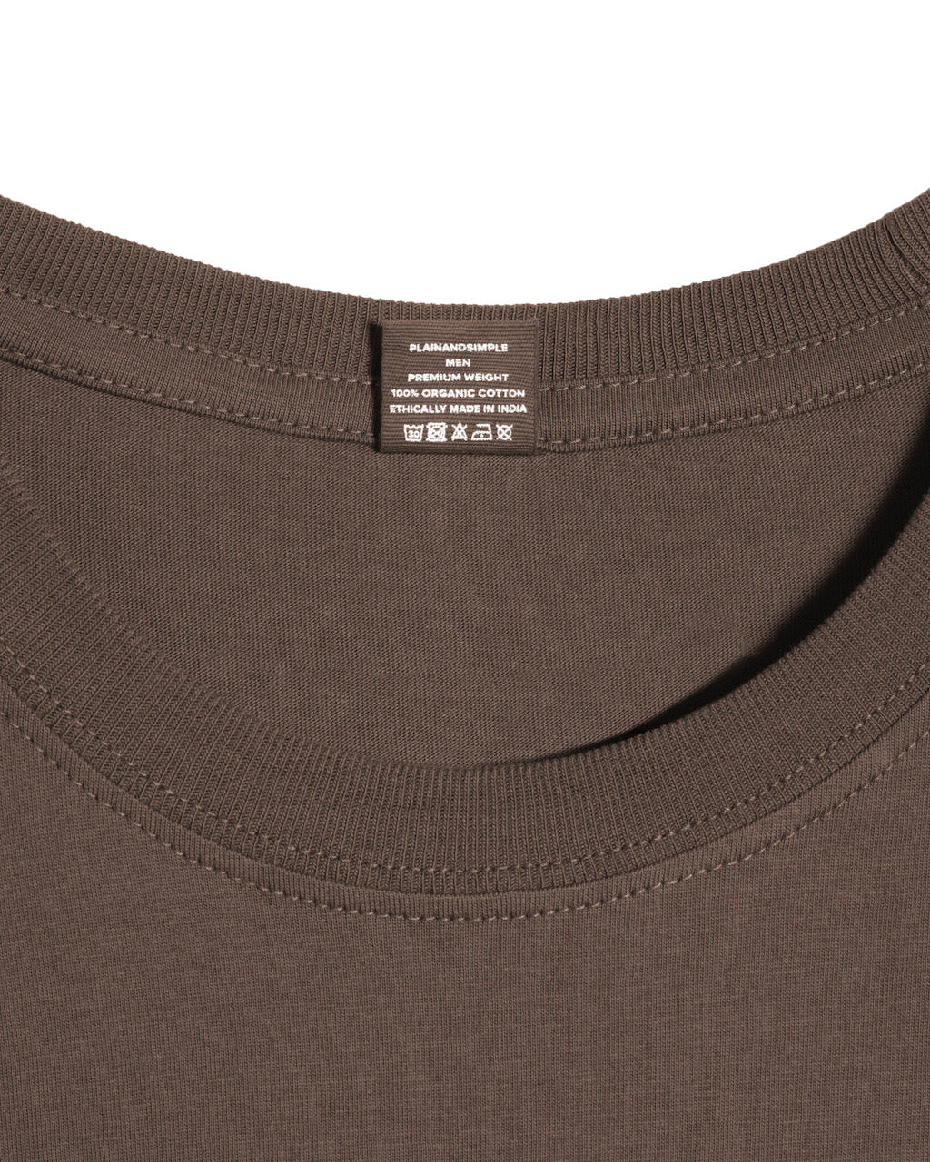 A close up of a neck label in a men's dark khaki short sleeve crew neck organic cotton t shirt.