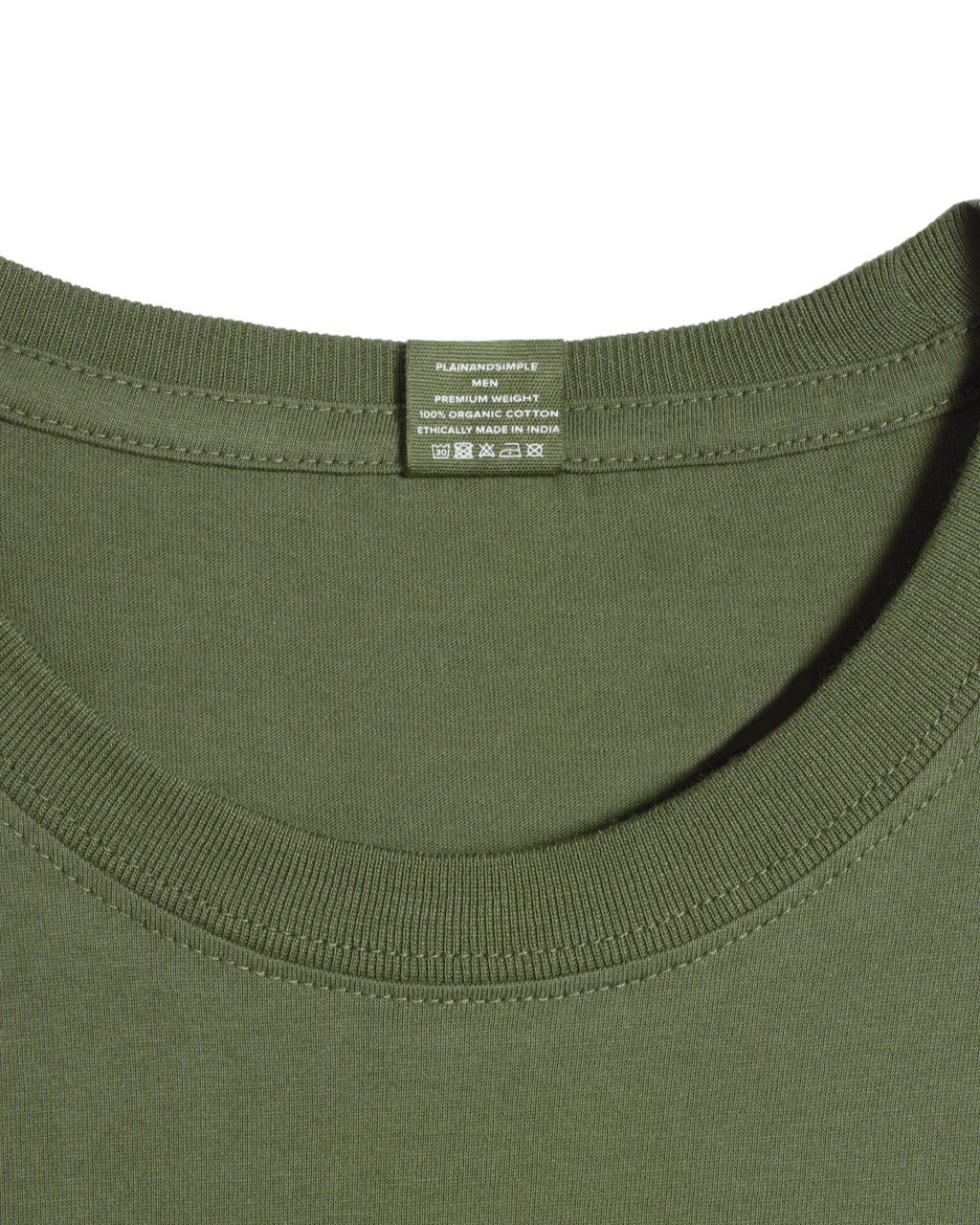 A close up of a neck label in a men's khaki green short sleeve crew neck organic cotton t shirt.