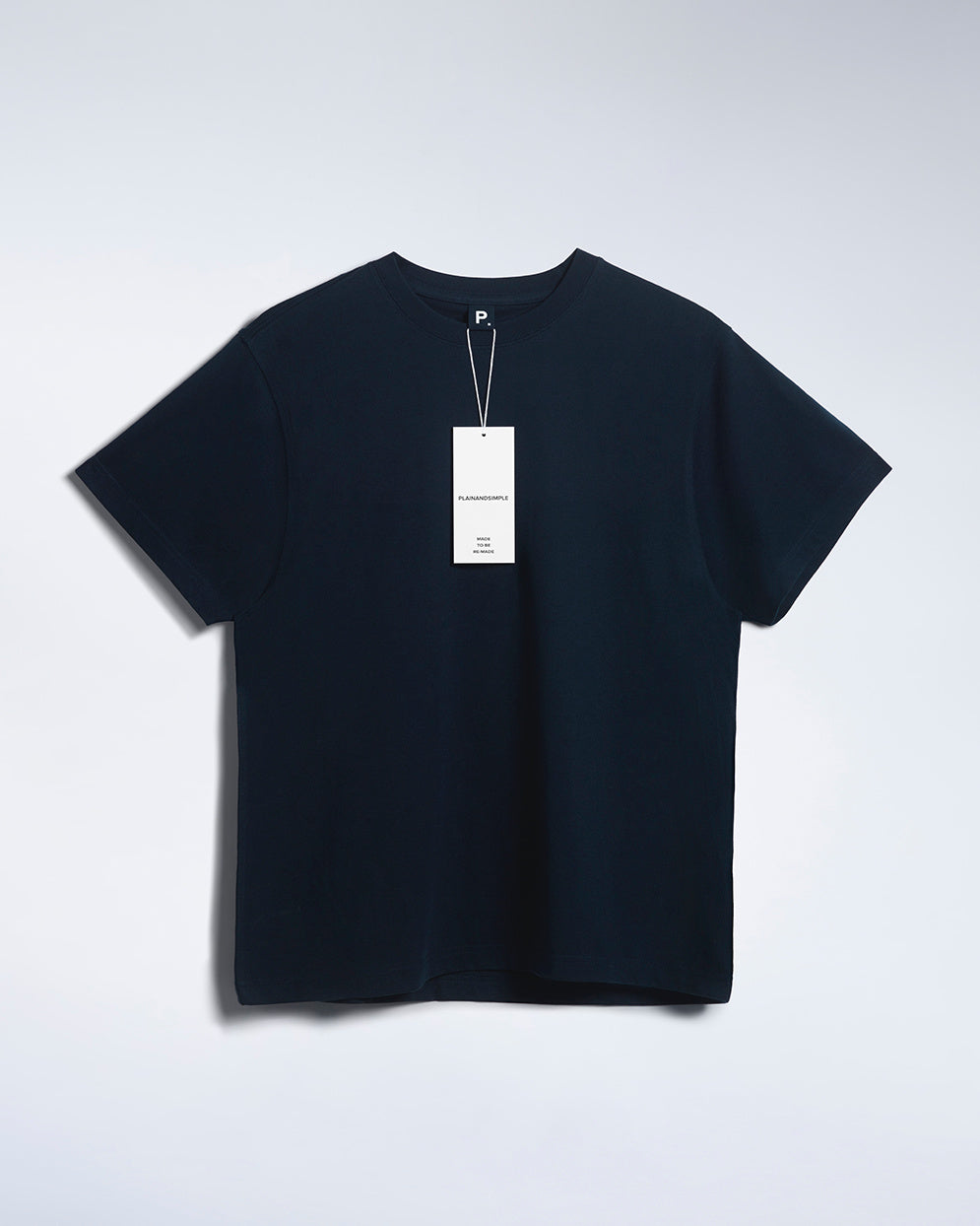 A flatlay of a men's navy, premium weight, organic cotton t shirt.