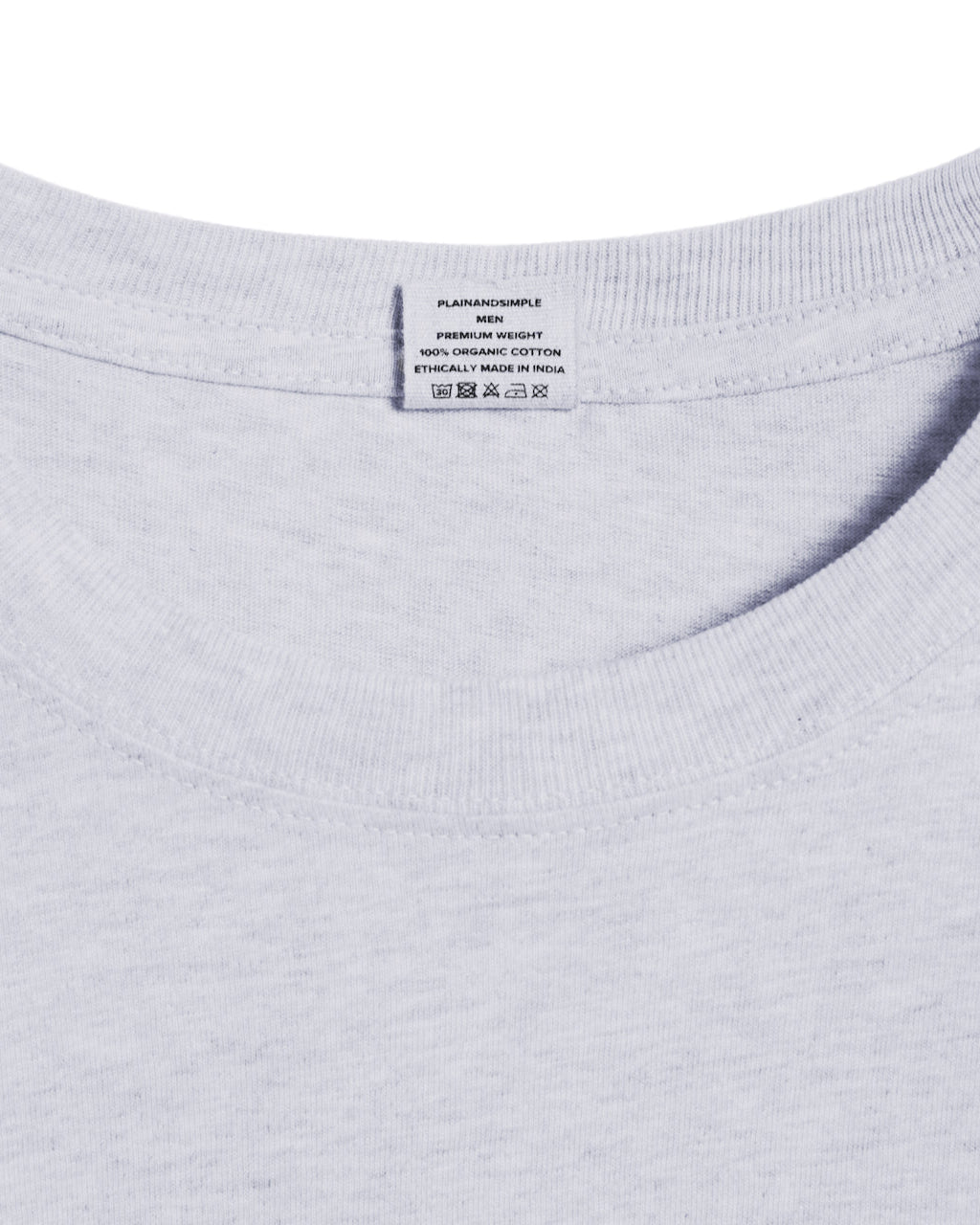 A close up of a neck label in a men's grey short sleeve crew neck organic cotton t shirt.