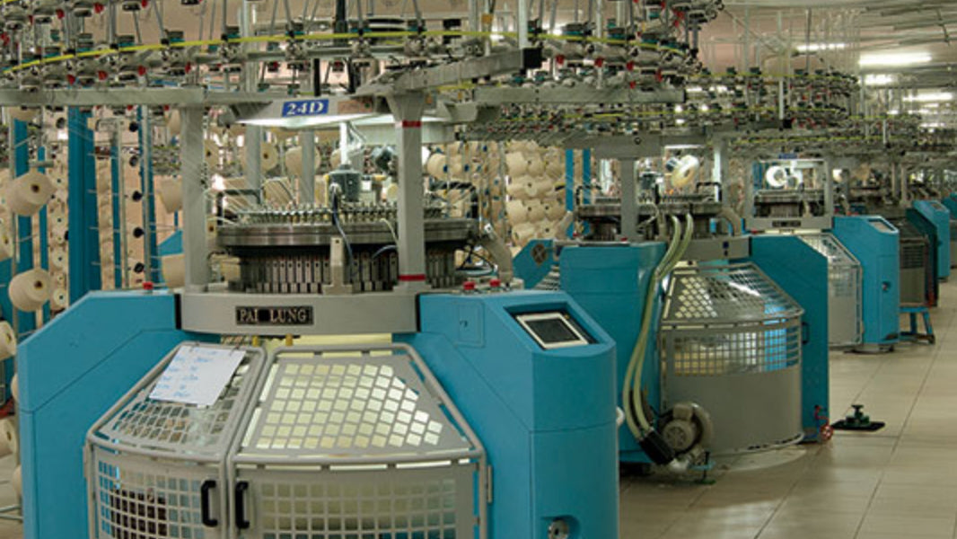 A photo of large machines inside an ethical factory in India.