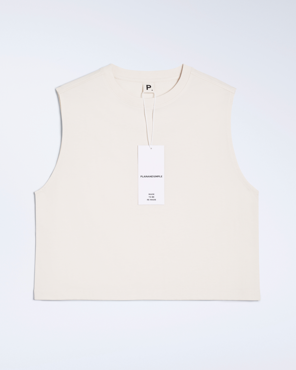 A flatlay of a natural coloured, organic cotton, crew neck tank top.