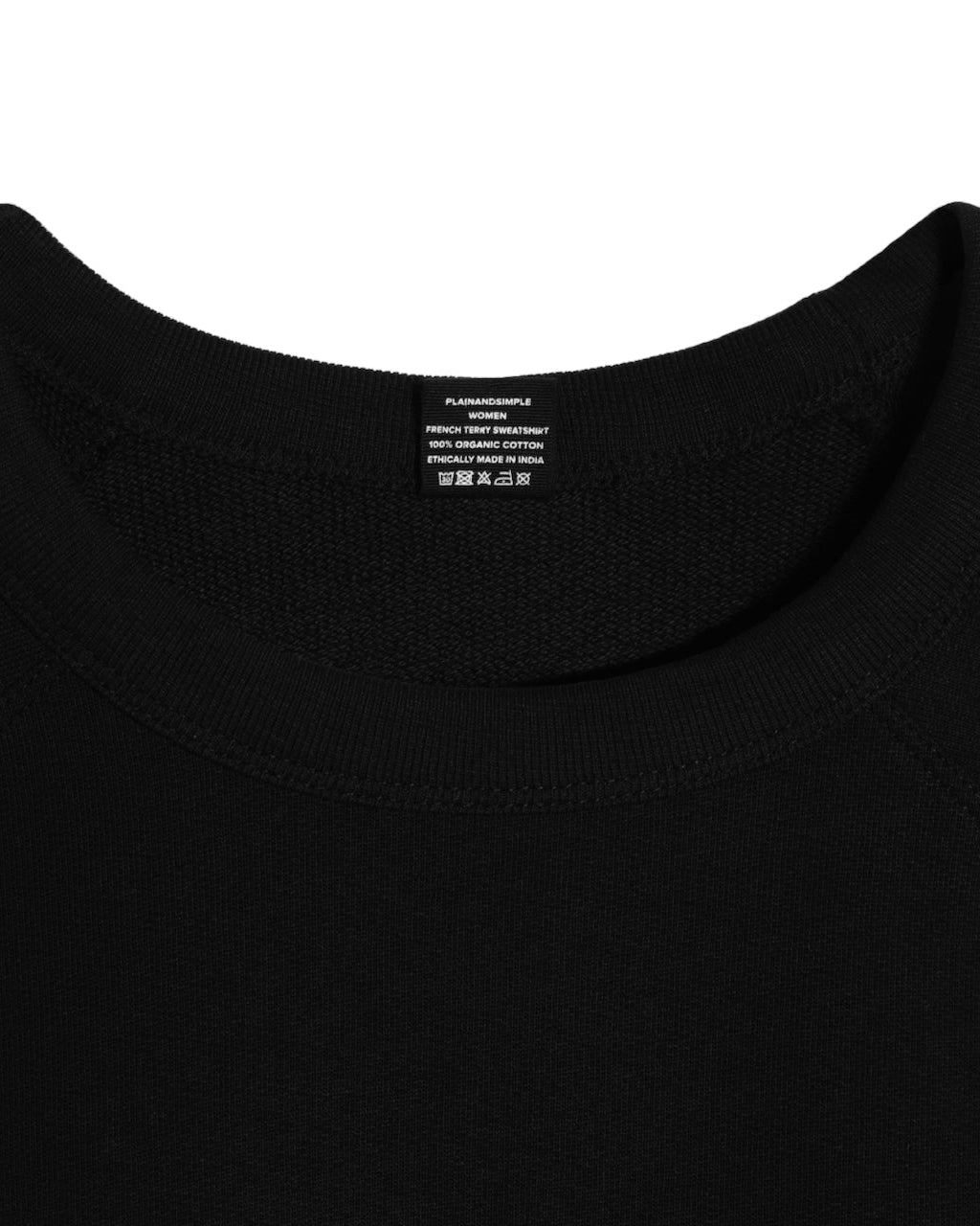 A close up of an neck label in a women's black organic cotton sweatshirt.