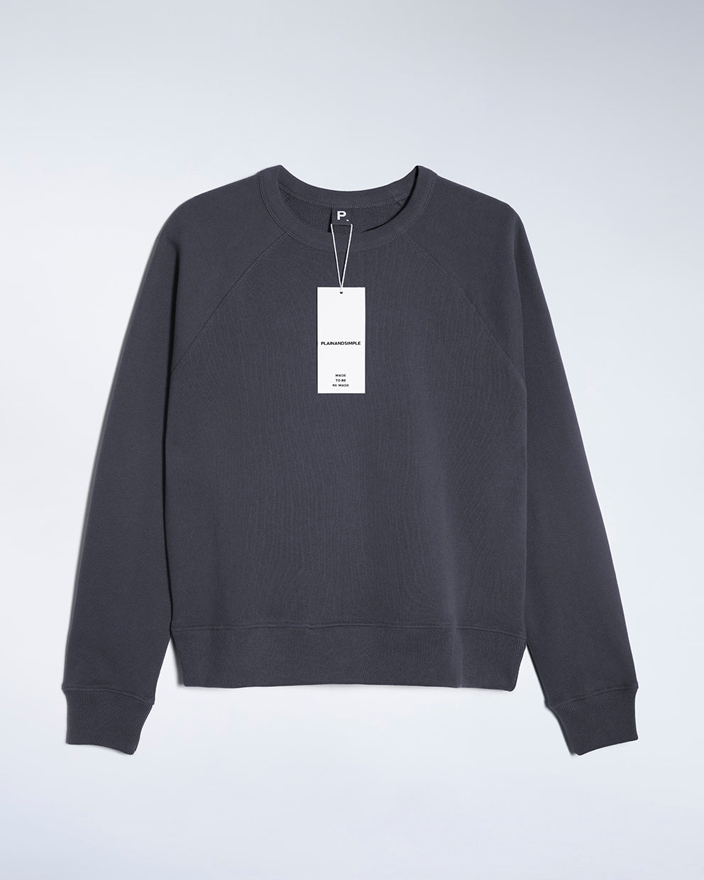 A flatlay of a women's plain dark grey organic cotton sweatshirt.