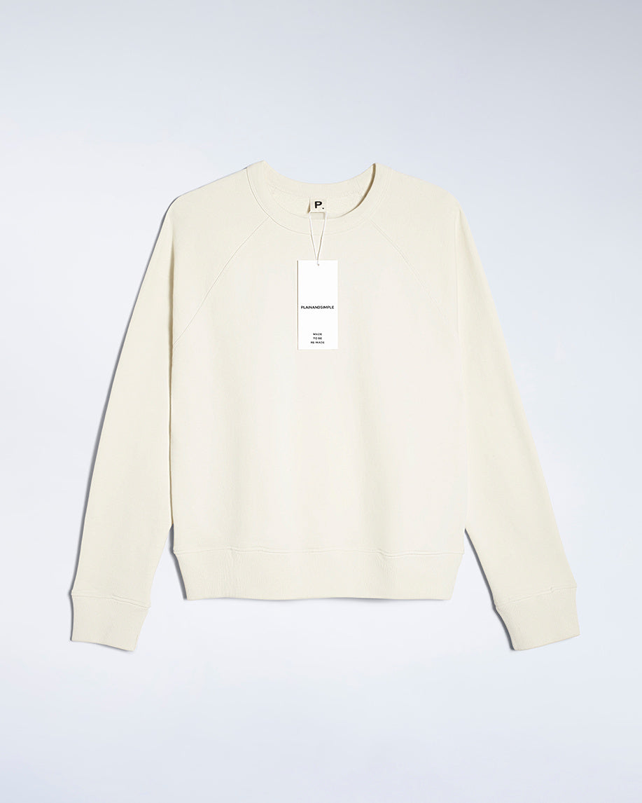 A flatlay of a women's plain ecru organic cotton sweatshirt.