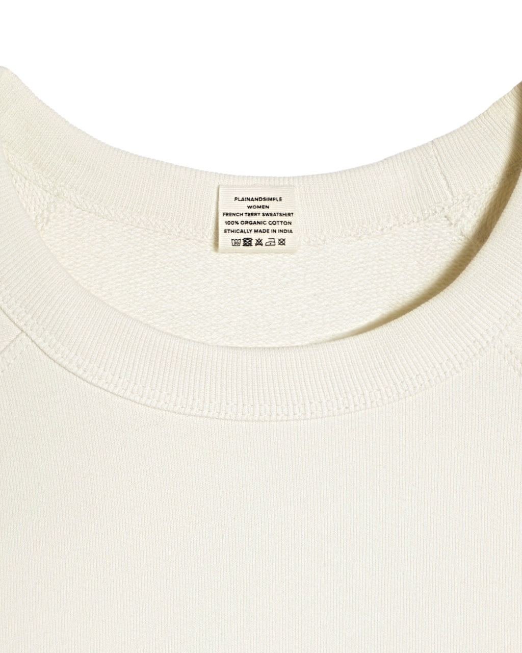 A close up of an neck label in a women's ecru organic cotton sweatshirt.
