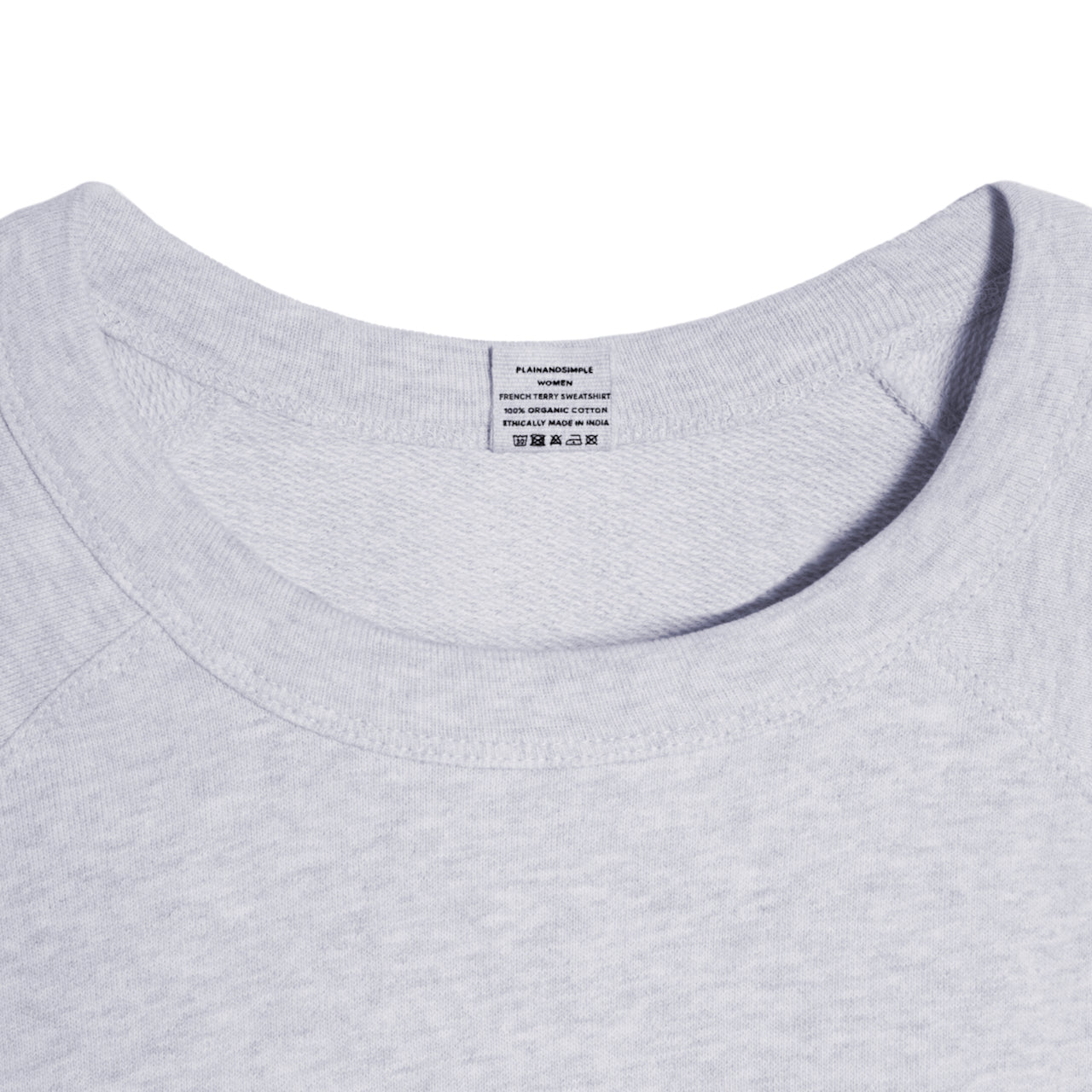 A close up of an neck label in a women's grey organic cotton sweatshirt.