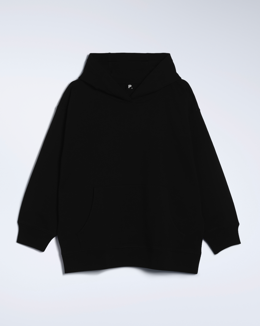 A flatlay of a black, oversized, organic cotton hoodie.