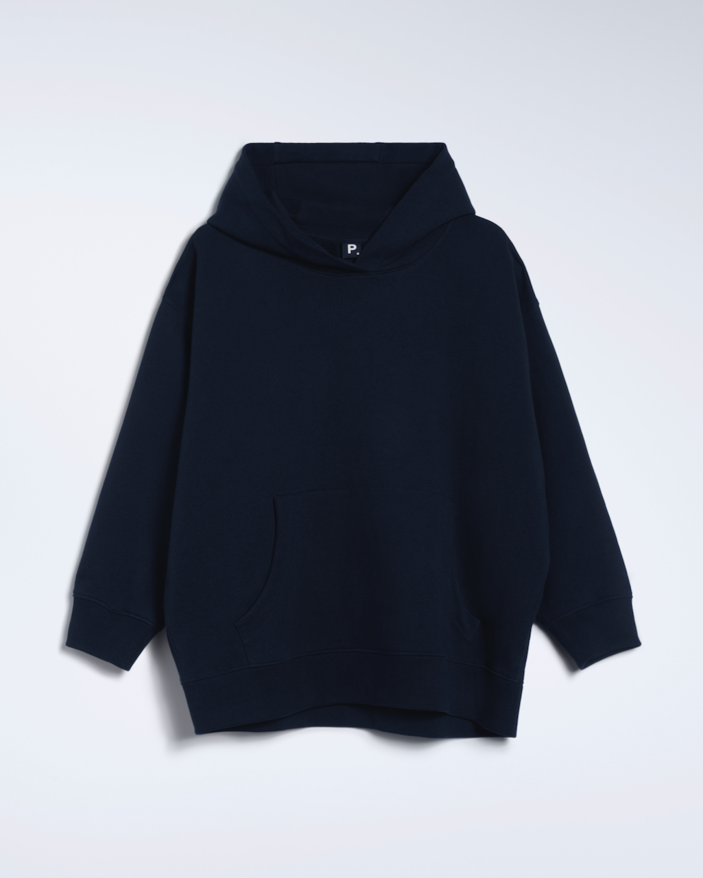 A flatlay of a navy, oversized, organic cotton hoodie.