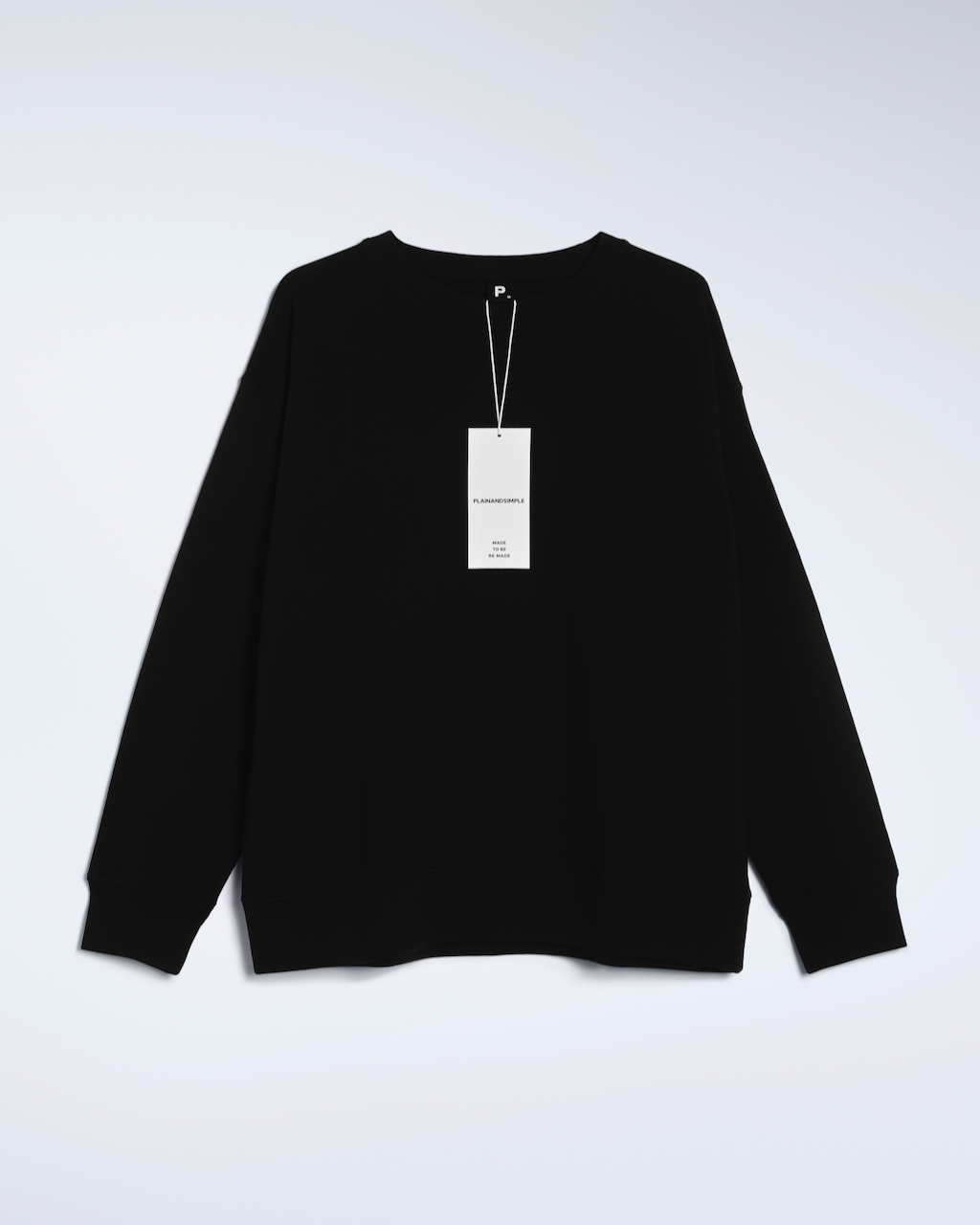 A flatlay of a black, oversized, organic cotton sweatshirt.
