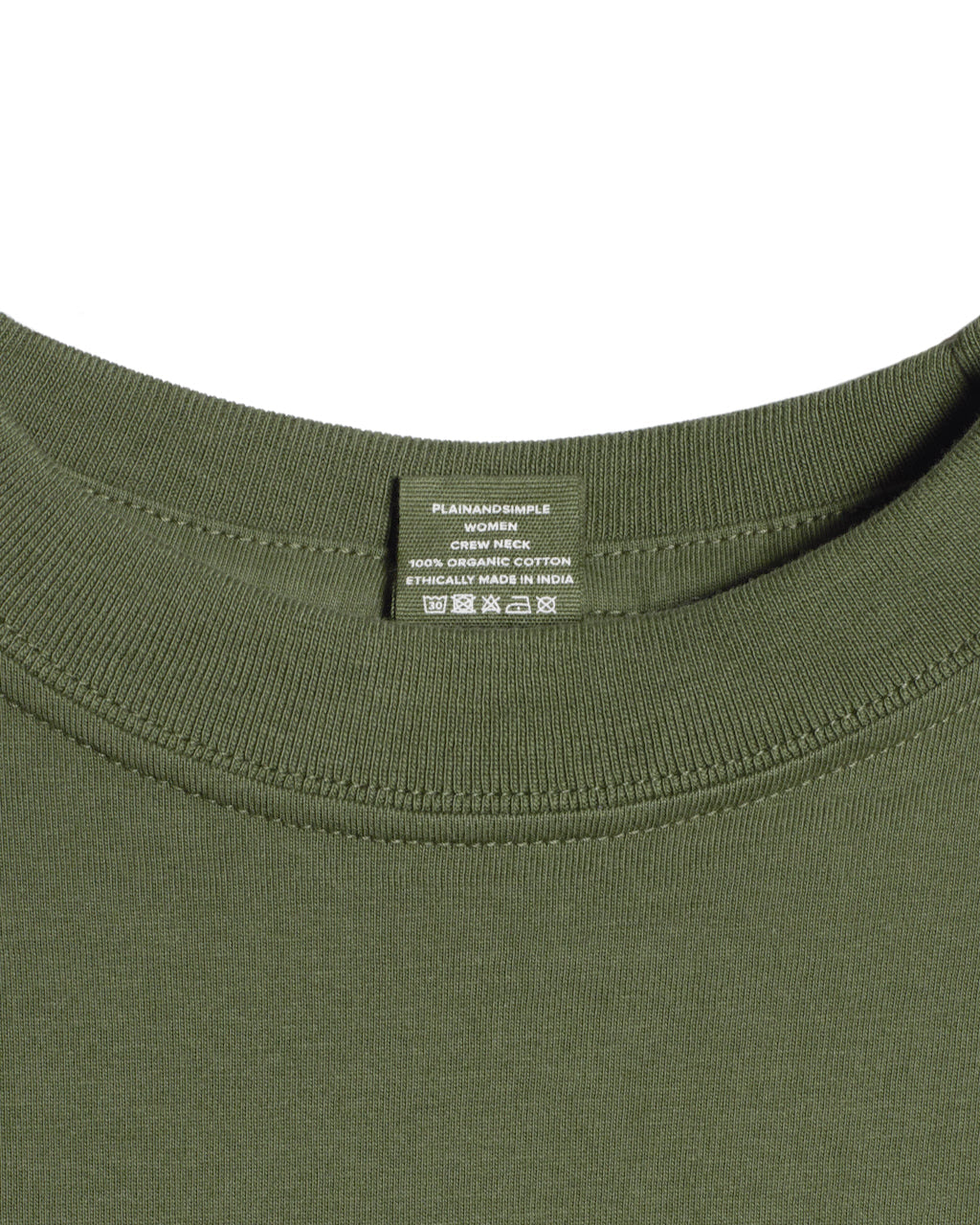 A close up of a neck label in a women's khaki green short sleeve crew neck organic cotton t shirt.