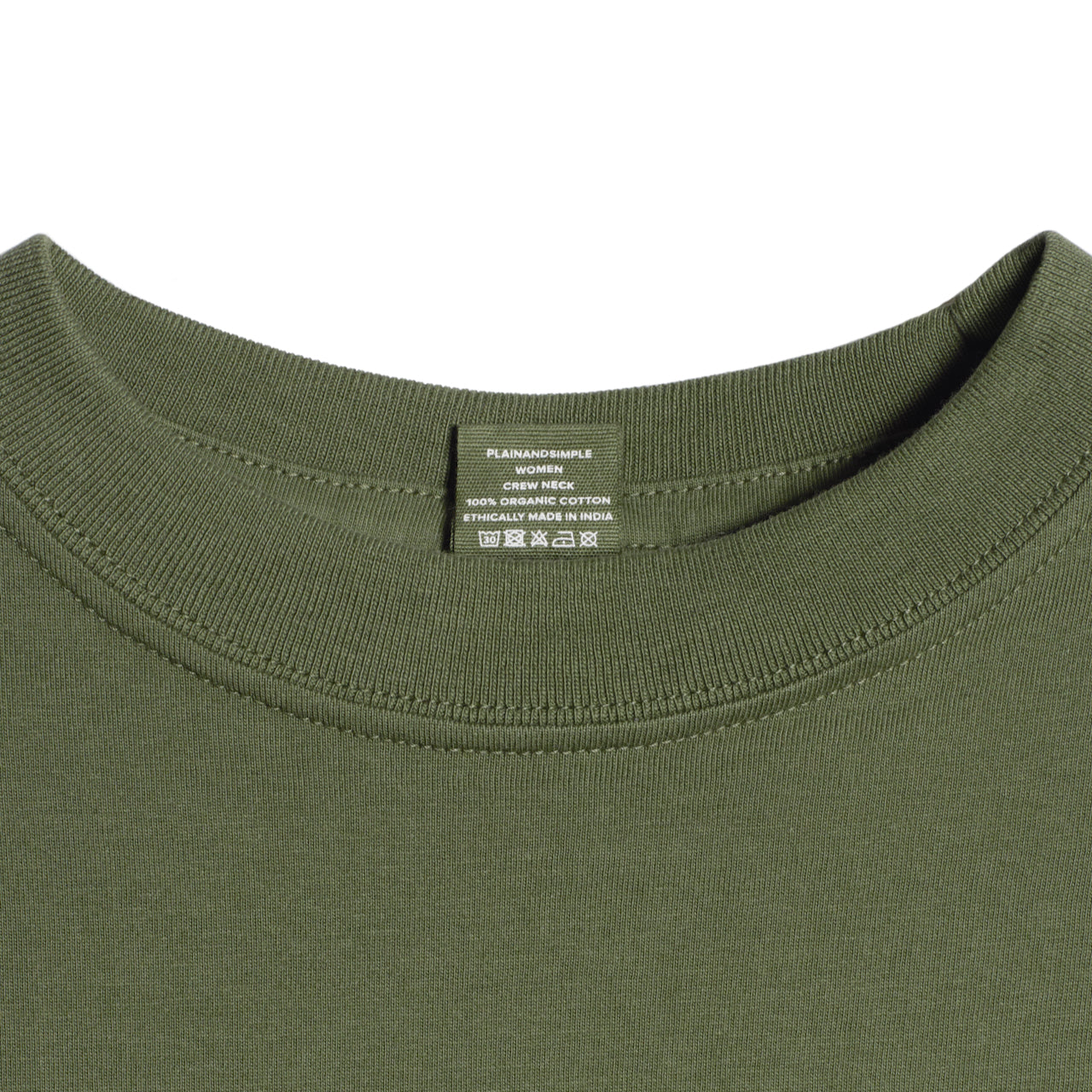 A close up of a neck label in a women's khaki green short sleeve crew neck organic cotton t shirt.