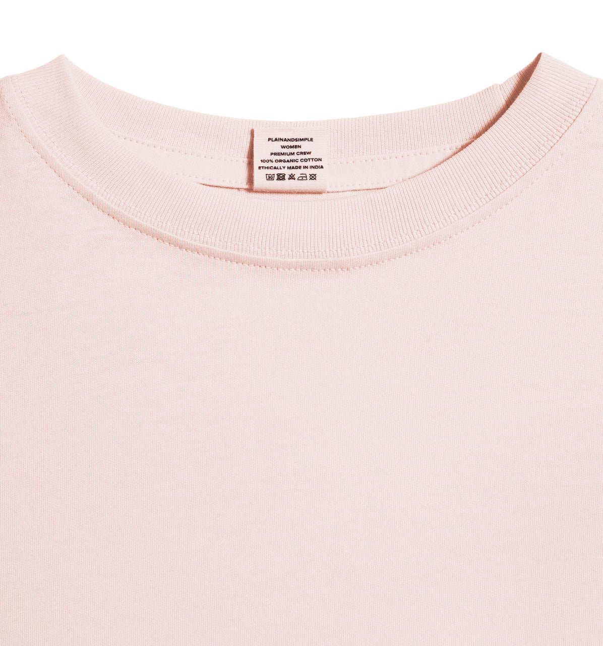 A close up of an neck label in a women's pink short sleeve crew neck organic cotton t shirt.