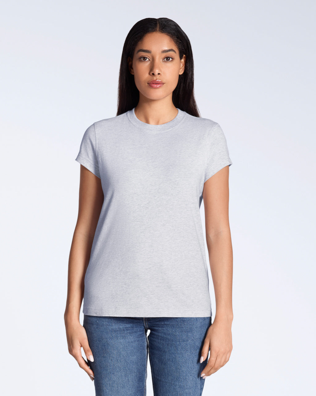 A woman facing front on, modelling a plain grey short sleeve organic cotton t shirt.