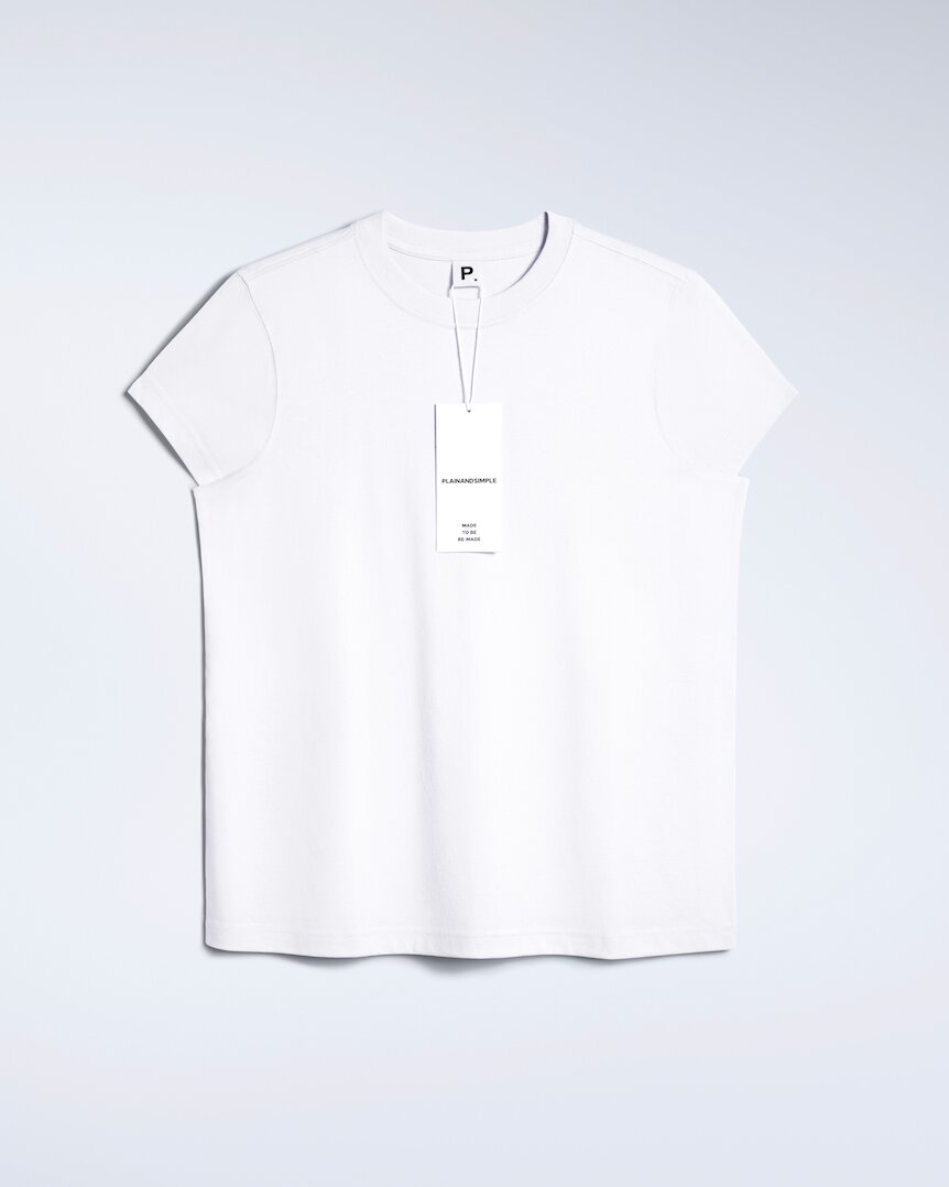 A flatlay of a women's plain white short sleeve crew neck organic cotton t shirt.