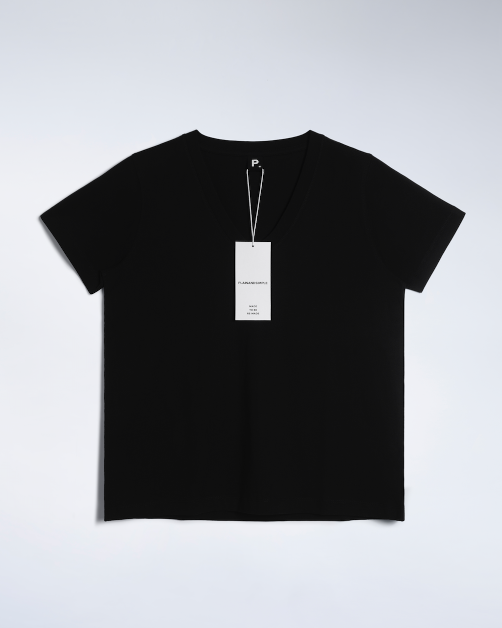 A flatlay of a black, v neck, organic cotton t shirt.